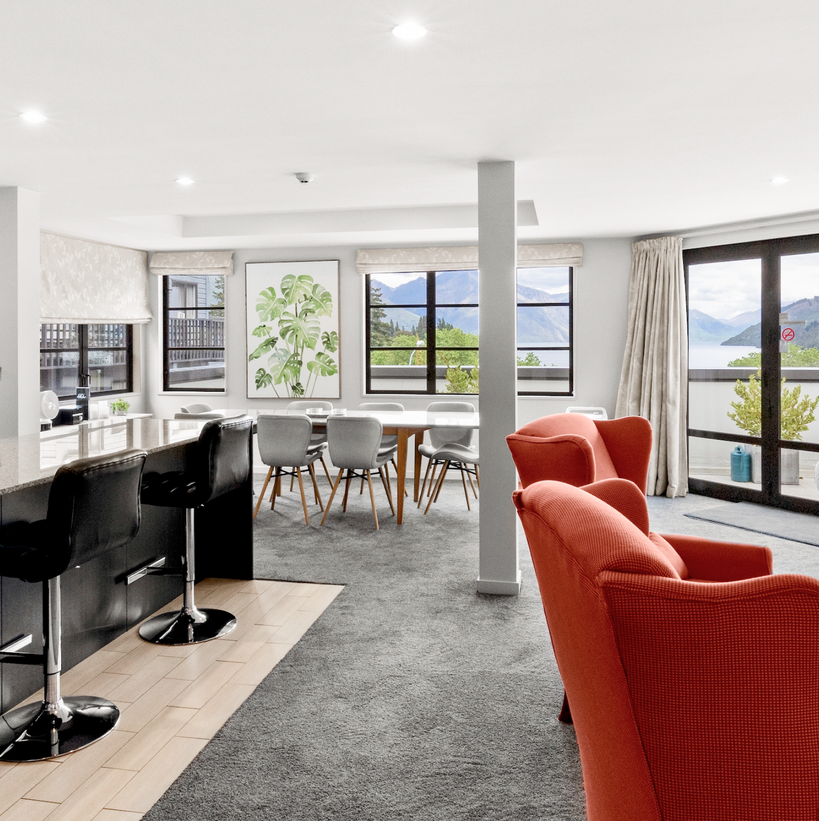 Luxury Penthouse with kitchen table and red couches